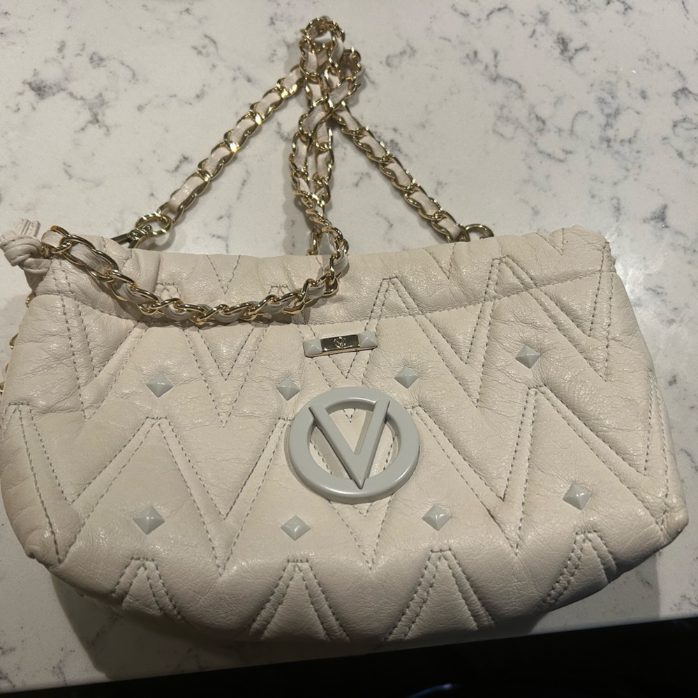 Valentino Cara studded quilted convertible clutch